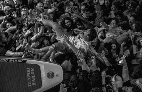 Drain hardcore band stage diving into the crowd 